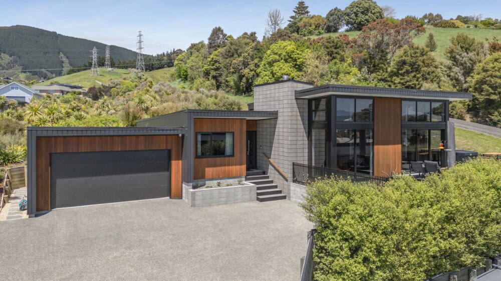 Contemporary home on Wrights Road Richmond featuring cedar and concrete cladding, expansive glass, and elevated outdoor living — designed and built by Bruce Design & Build.