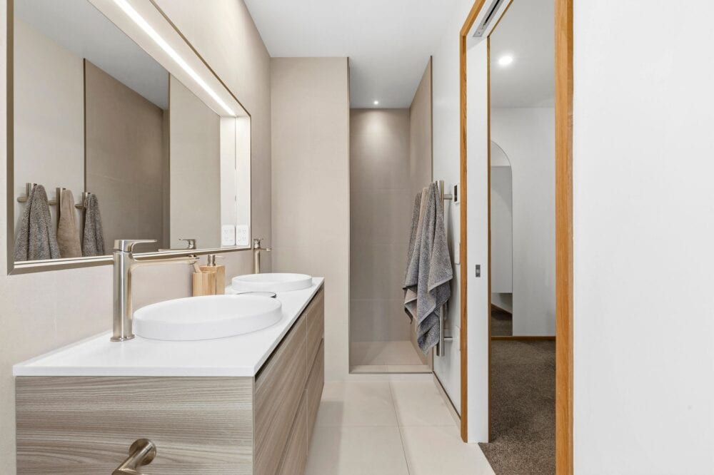Contemporary bathroom with timber vanity and modern finishes in a Richmond, Nelson home