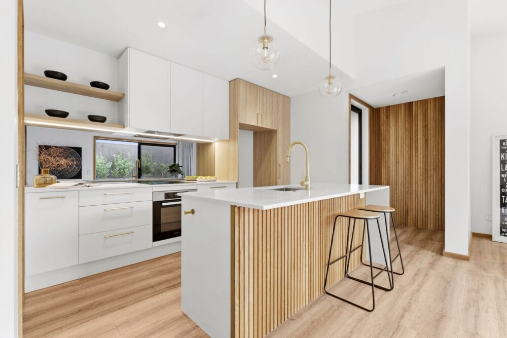 Modern designer kitchen with timber cabinetry and island in a custom-built Richmond home