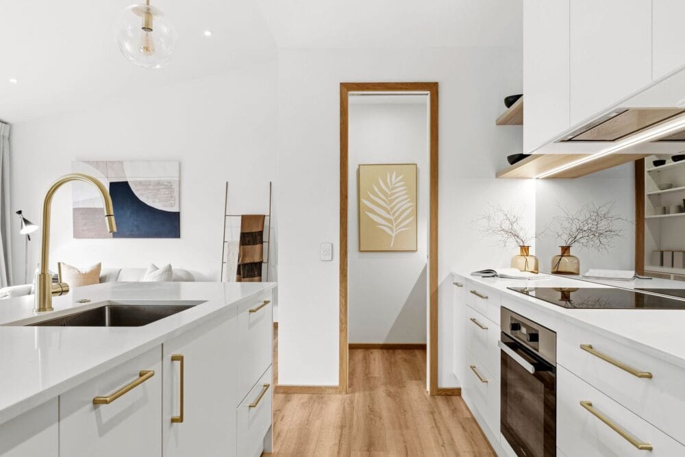 Contemporary kitchen with timber flooring and modern cabinetry in a Richmond, Nelson home